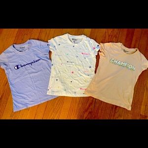 Lot of girls champion shirts. Selling 3 shirts together. All size medium.